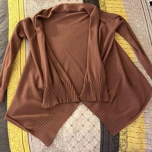 Dark pink cardigan that can go with any shirt, tank top, or dress